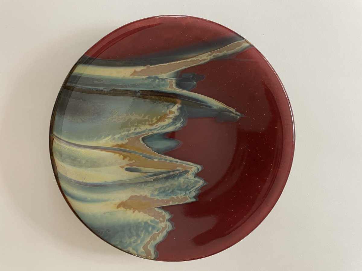 Red and teal round plate