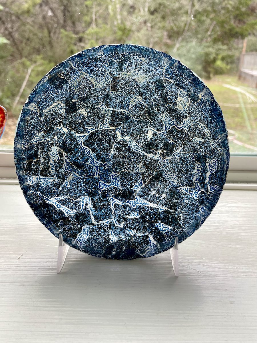 Dark blue plate with white crystalline