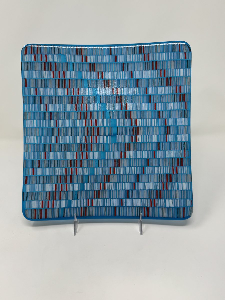 Blue platter with striped grid pattern