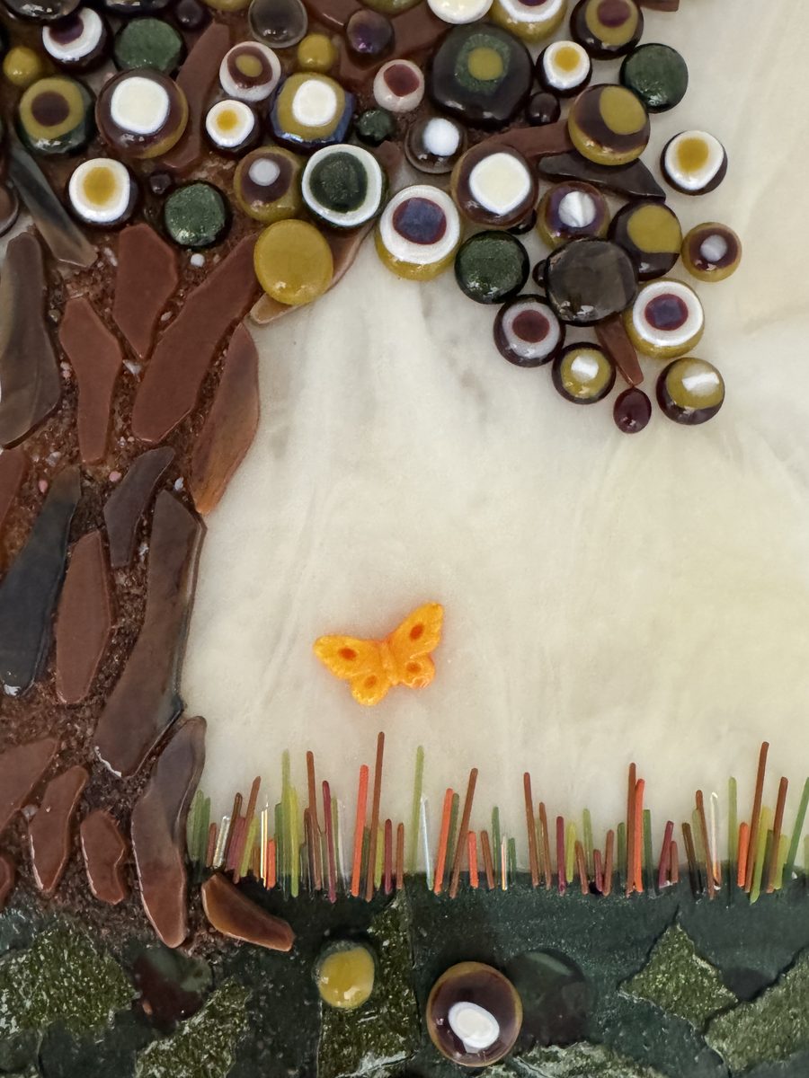 Tree mosaic detail with butterfly