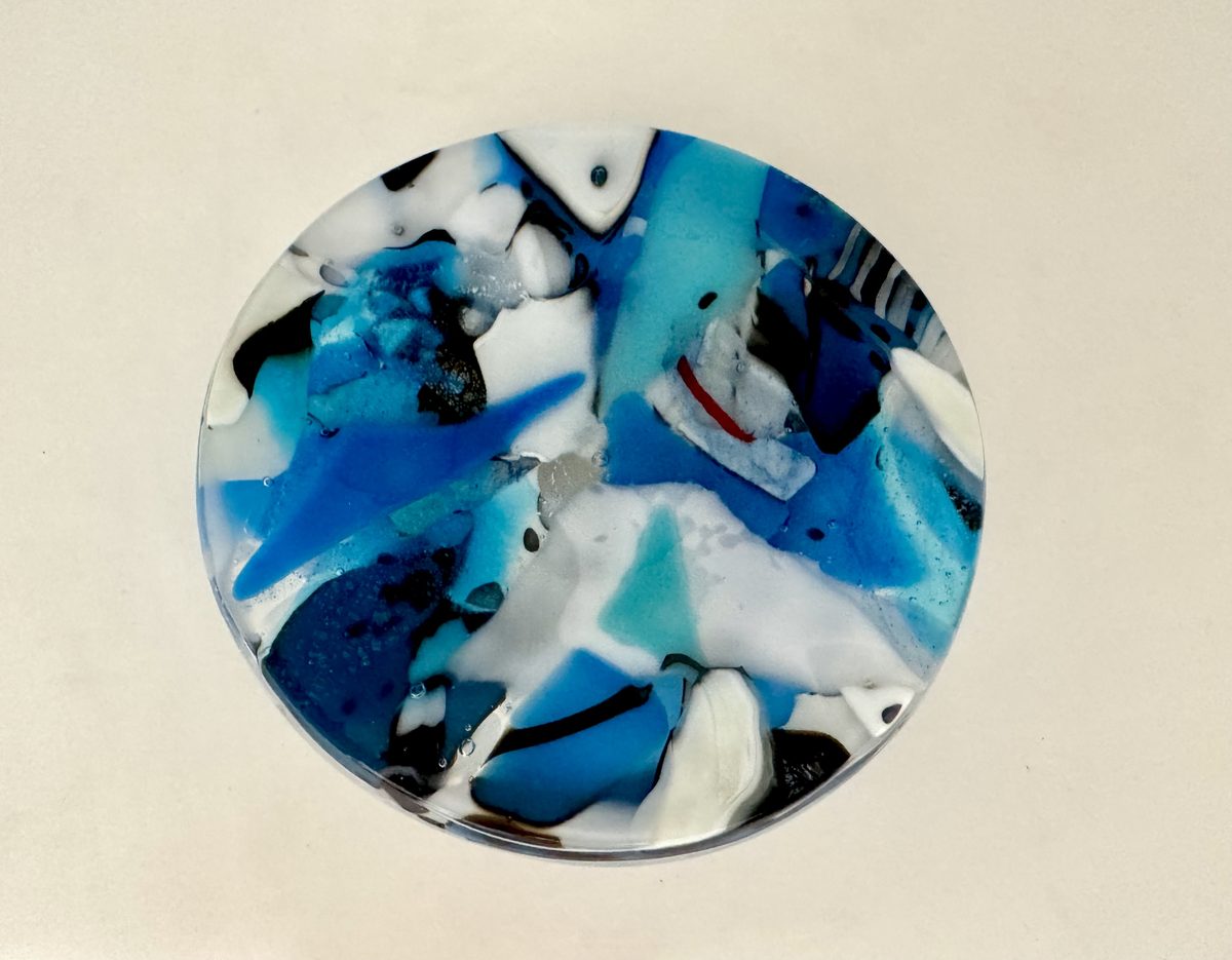 Blue white round plate on stand