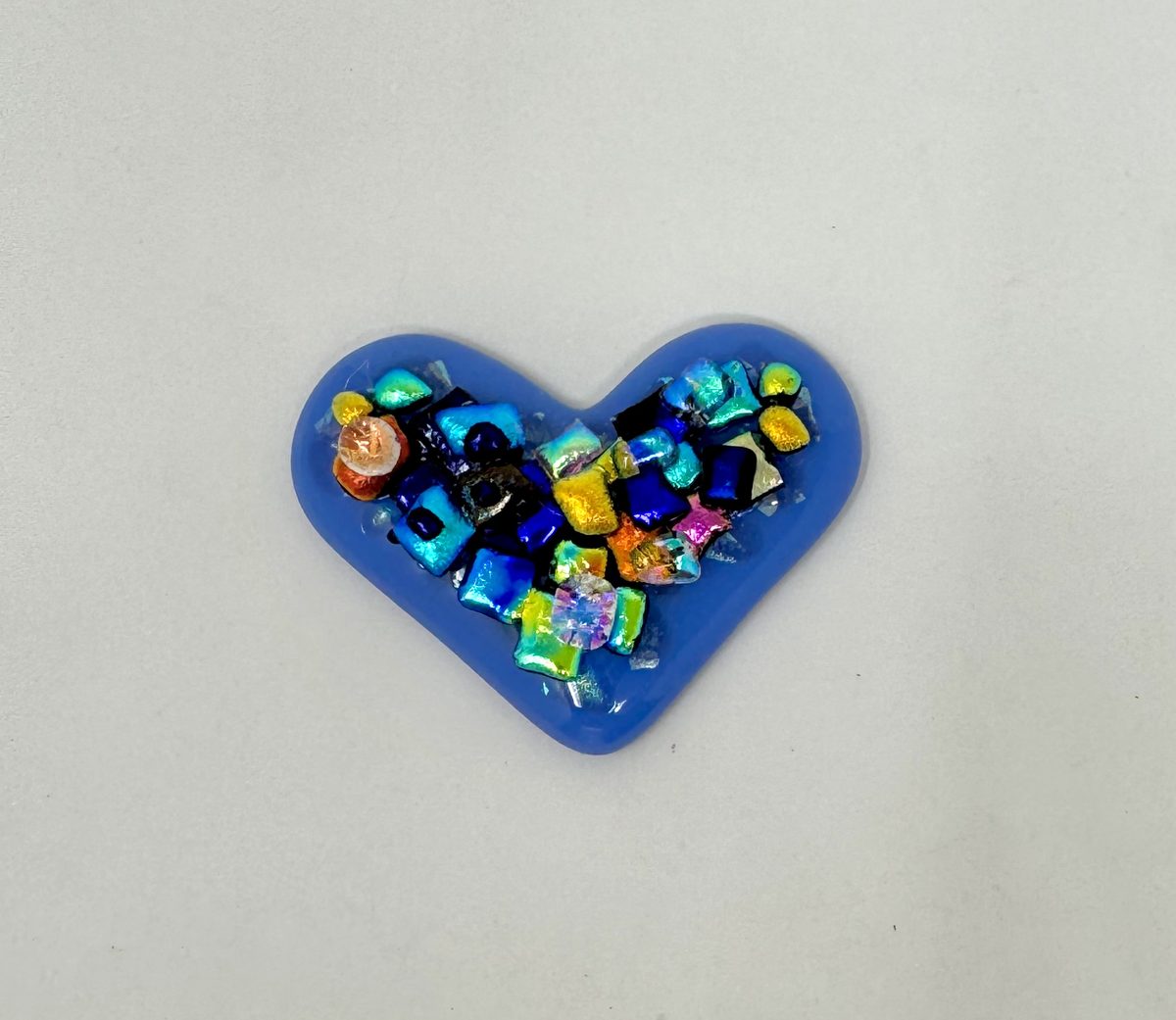 Blue heart with colorful glass elements