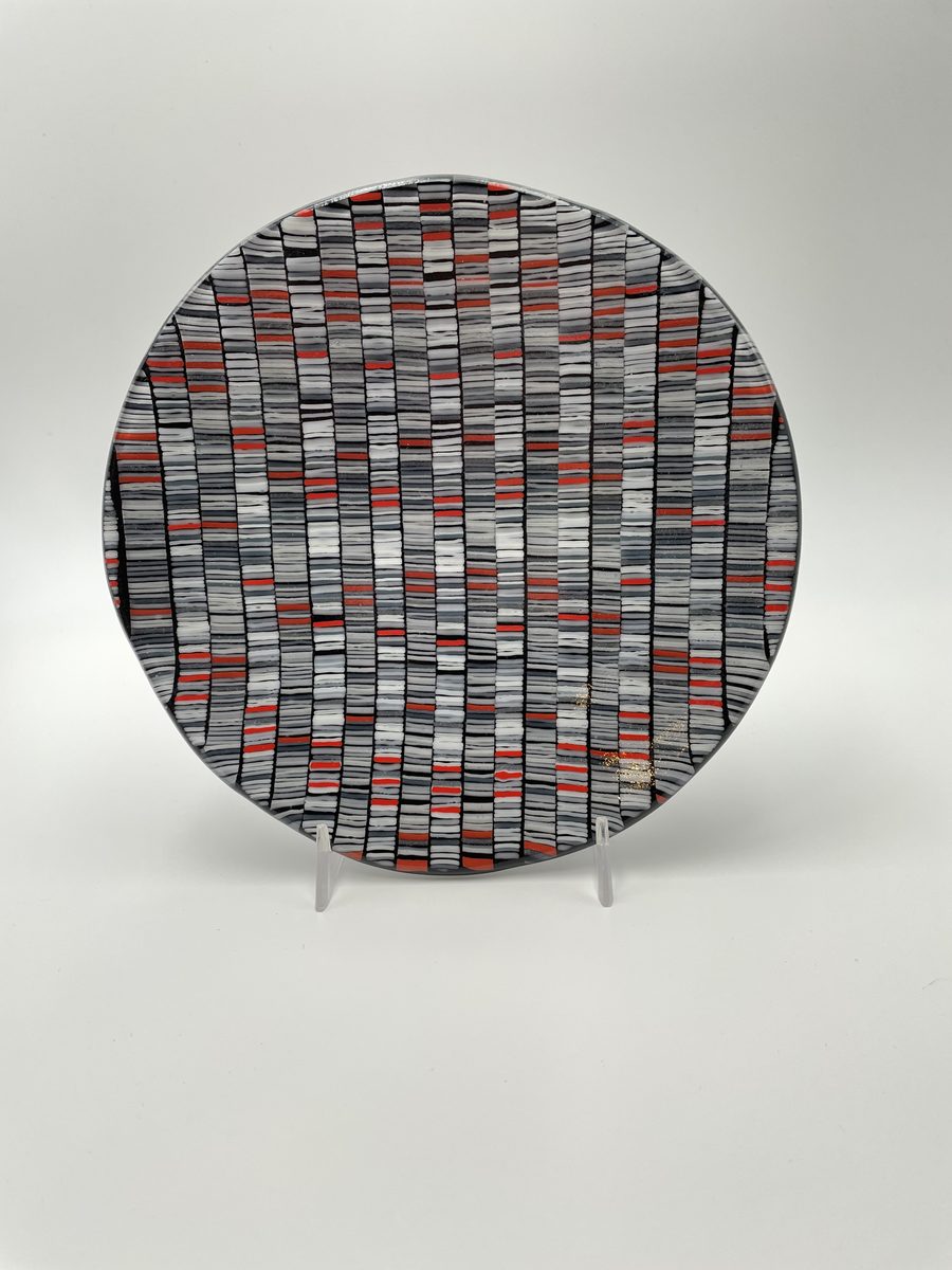 Black red white pixelated pattern plate