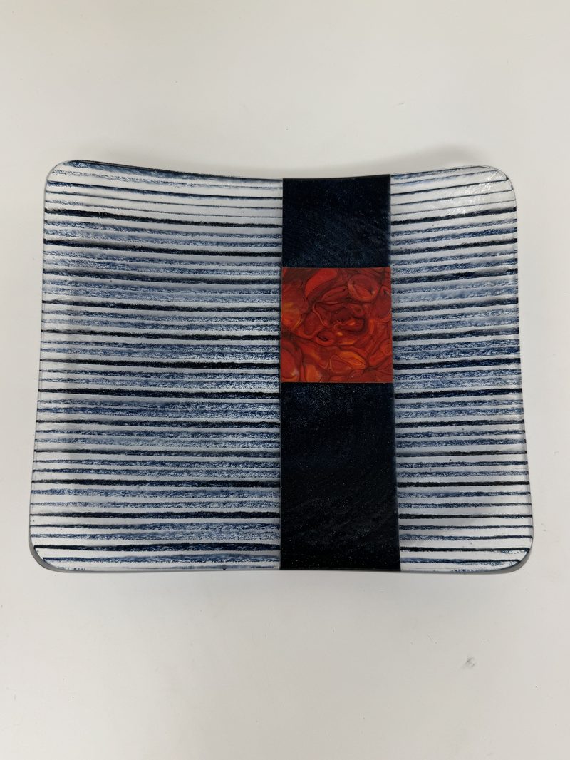 Striped plate with red accent